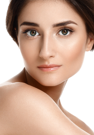 Beautiful Face of Young Woman Model with Clean Fresh Perfect Healthy Skin. Age and Health Concept. Beauty Woman Portrait isolated on whiteの写真素材