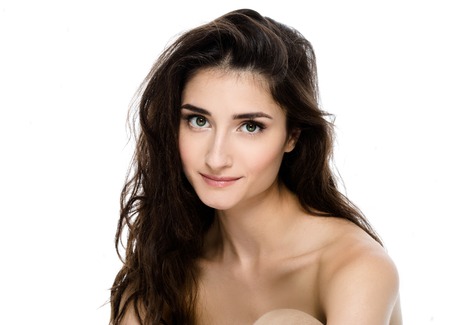 Beautiful Face of Young Woman Model with Clean Fresh Perfect Healthy Skin. Age and Health Concept. Beauty Woman Portrait isolated on whiteの写真素材