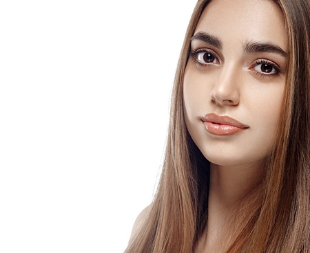 Beautiful woman portrait face studio isolated on white.の写真素材