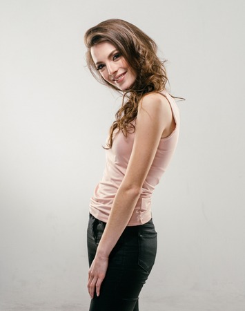 Portrait of beautiful young curly hair woman girl. Fashion photoの写真素材
