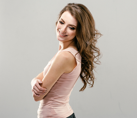 Portrait of beautiful young curly hair woman girl. Fashion photoの写真素材