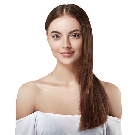 Beautiful woman portrait face with long healthy hair studio. Studio shot. Isolated on white.の写真素材