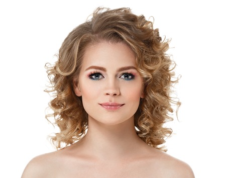 Curly hair woman portrait long hair with perfect make up red lips. Studio shot. Isolated on whiteの写真素材