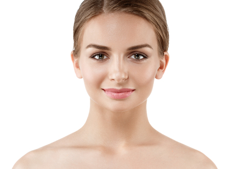 Beautiful woman face close up portrait young. Studio shot. Isolated on white.の写真素材