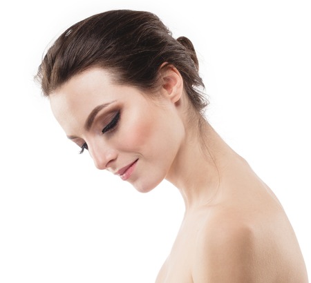Young beautiful woman face portrait with healthy skin. Studio shot.の写真素材