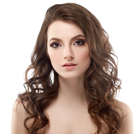 Young beautiful woman face portrait with healthy skin. Studio shot.の写真素材