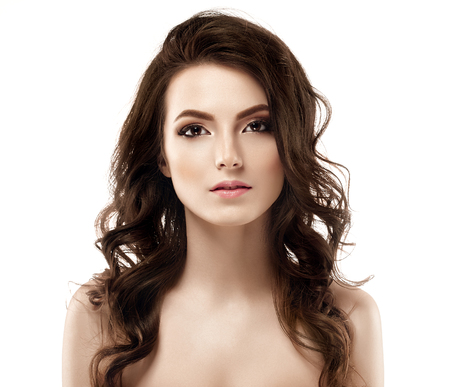Young beautiful woman face portrait with healthy skin. Studio shot.の写真素材