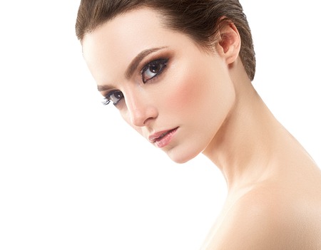 Beautiful woman portrait face. Studio shot. Isolated on white.の写真素材