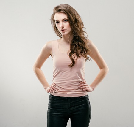 Portrait of beautiful young curly hair woman girl. Fashion photoの写真素材