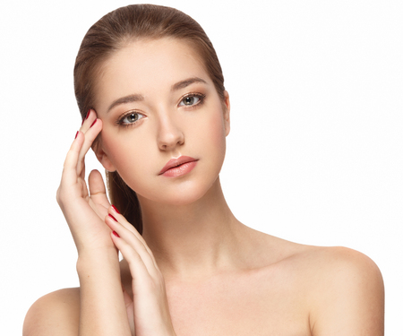 Woman portrait beautiful close-up with healthy skin happy. Studio shot. Isolated on white.の写真素材
