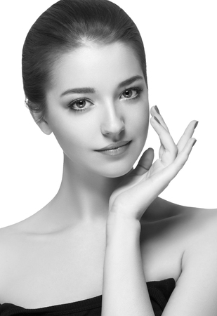 Beauty Woman face Portrait. Black and white. Beautiful model Girl with Perfect Fresh Clean Skin. Youth and Skin Care Concept.の写真素材