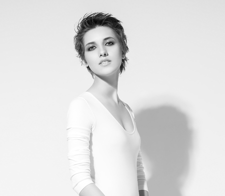 Beauty Woman face Portrait. Black and white. Beautiful model Girl with Perfect Fresh Clean Skin. Youth and Skin Care Concept.の写真素材