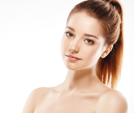 Beautiful woman face studio on white with sexy lips. Studio shot.の写真素材