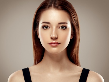 Amazing woman portrait. Beautiful girl model fashion. Studio shot.の写真素材