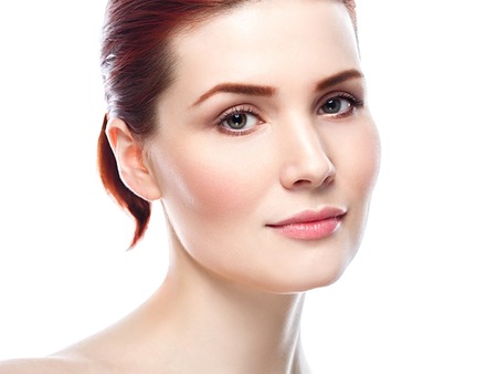 Glamour portrait of beautiful woman model with fresh daily makeup Healthy skin concept isolated on white backgroundの写真素材