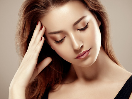 Amazing woman portrait. Beautiful girl model fashion. Studio shot.の写真素材