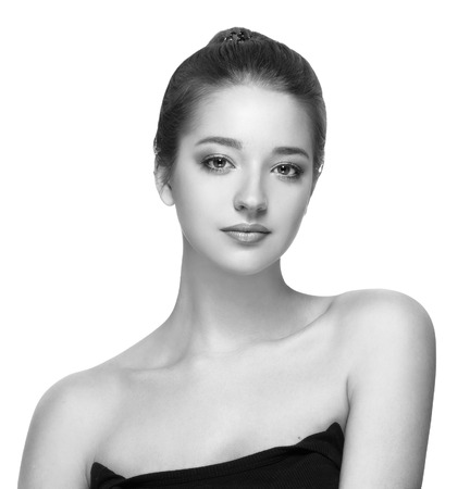Beauty Woman face Portrait. Black and white. Beautiful model Girl with Perfect Fresh Clean Skin. Youth and Skin Care Concept.の写真素材