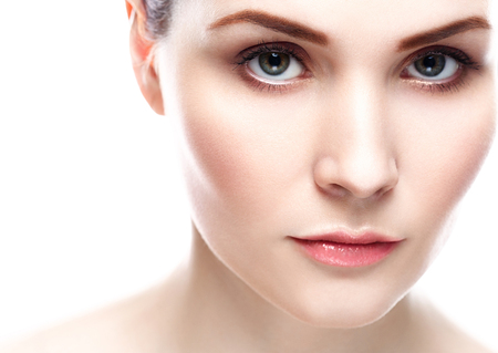 Woman Eyes Beauty portrait of attractive female. Skin care, cosmetics and makeup concept.Isolated on white. Healthy perfect skin.の写真素材
