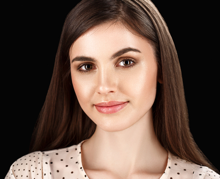 Fashion Beautiful woman portrait close up on black background. Studio shot.の写真素材