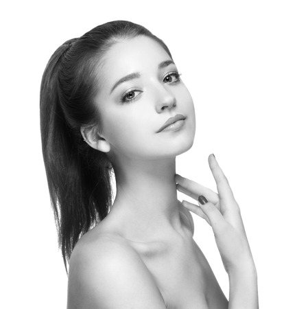Beauty Woman face Portrait. Black and white. Beautiful model Girl with Perfect Fresh Clean Skin. Youth and Skin Care Concept.の写真素材