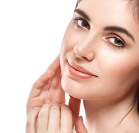 Woman Beauty portrait of attractive female. Skin care, cosmetics and makeup concept.Isolated on white. Healthy perfect skin.の写真素材