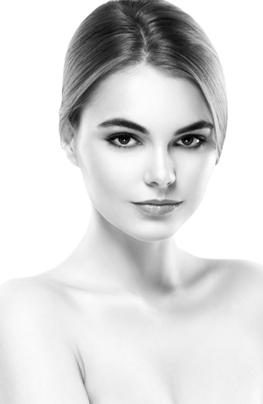 Blonde woman beauty portrait close-up. Isolated on white. Black and white. Studio shot.の写真素材