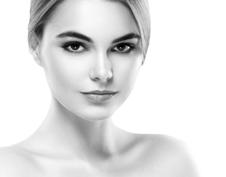 Blonde woman beauty portrait close-up. Isolated on white. Black and white. Studio shot.の写真素材