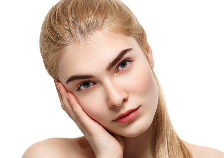 Blonde woman beauty portrait close-up isolated on white. Studio shot.の写真素材