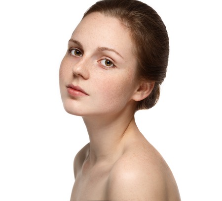Woman beauty portrait closeup with healthy skin.  Studio shot. Isolated on white.の写真素材