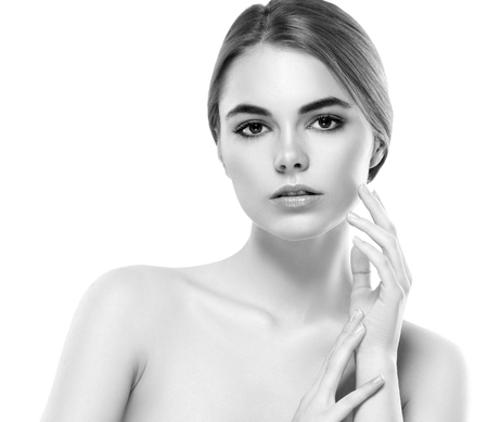 Blonde woman beauty portrait close-up. Isolated on white. Black and white. Studio shot.の写真素材