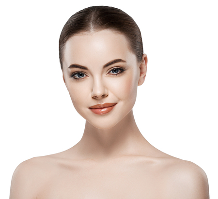 Beautiful woman face close up portrait young. Isolated on white. Studio shot.の写真素材