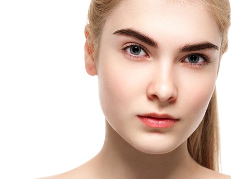 Blonde woman beauty portrait close-up isolated on white. Studio shot.の写真素材