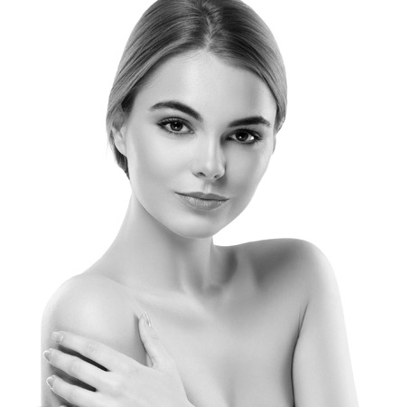 Blonde woman beauty portrait close-up. Isolated on white. Black and white. Studio shot.の写真素材