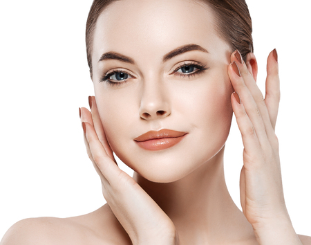 Woman beauty portrait isolated on white close up female face. Studio shot.の写真素材