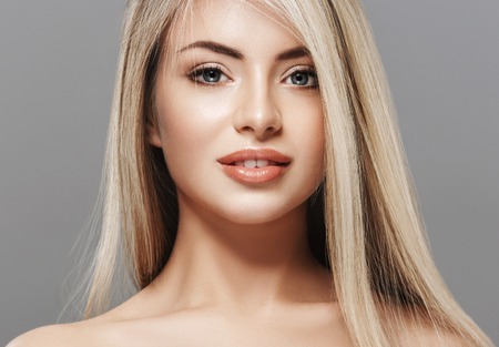 Beautiful woman blond portrait face. Studio shotの写真素材