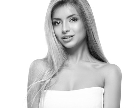 Beautiful woman portrait face studio isolated on white black and white. Studio shot.の写真素材