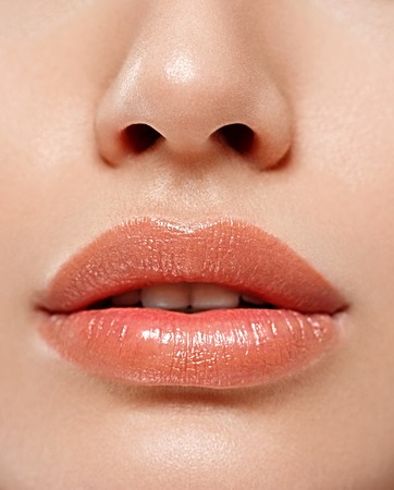 Perfect Lips. Sexy Girl Mouth close up. Beauty young woman Smile. Natural plump full Lip. Lips augmentation.Noseの写真素材