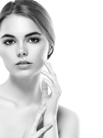 Blonde woman beauty portrait close-up. Isolated on white. Black and white. Studio shot.の写真素材