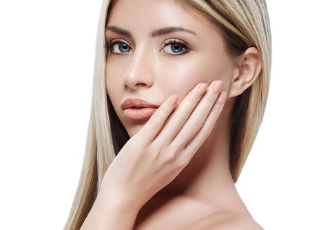 Blonde woman beauty portrait close-up. isolated on white. Studio shot.の写真素材