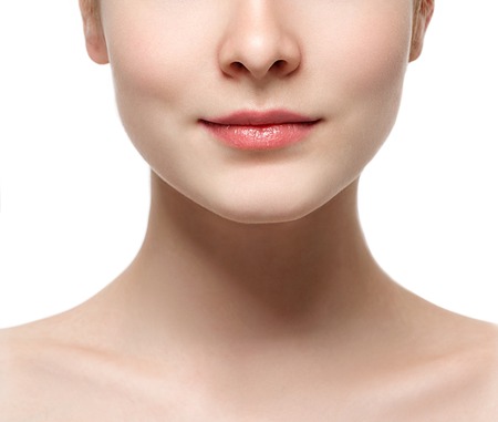 Lips neck Blonde woman beauty portrait close-up isolated on white. Studio shot.の写真素材
