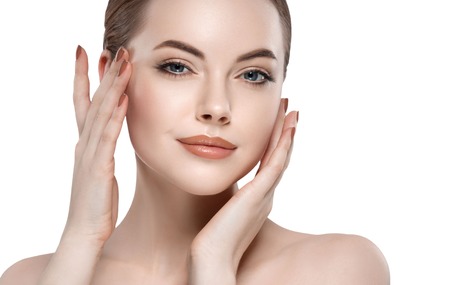 Woman beauty portrait isolated on white close up female face. Studio shot.の写真素材