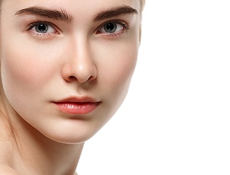 Blonde woman beauty portrait close-up isolated on white. Studio shot.の写真素材