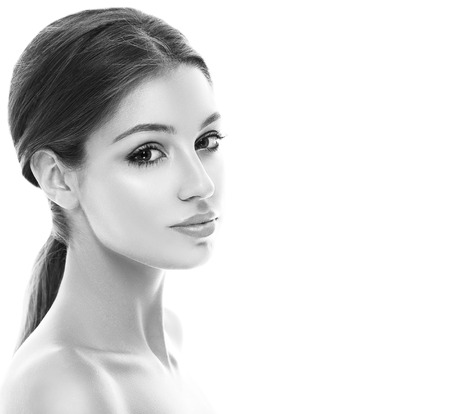 Blonde woman beauty portrait close-up. Isolated on white. Black and white. Studio shot.の写真素材