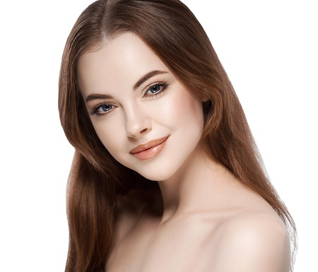 Beautiful woman portrait face. Isolated on white. Studio shot.の写真素材