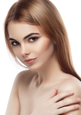 Beautiful woman face close up portrait young. Isolated on white. Studio shot.の写真素材
