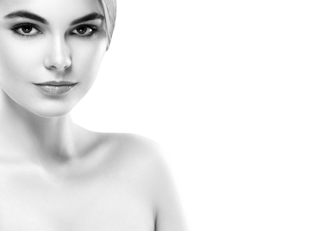 Blonde woman beauty portrait close-up. Isolated on white. Black and white. Studio shot.の写真素材