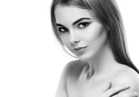 Blonde woman beauty portrait close-up. Isolated on white. Black and white. Studio shot.の写真素材
