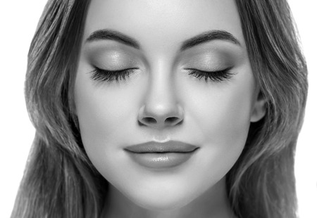 Closed woman eyes nose studio black and white. Studio.の写真素材