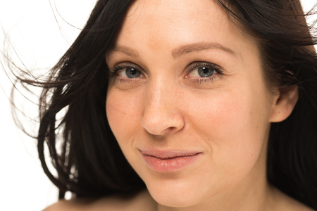 Woman with beautiful healthy long hair and skin  young studio portrait. Studio shot.の写真素材