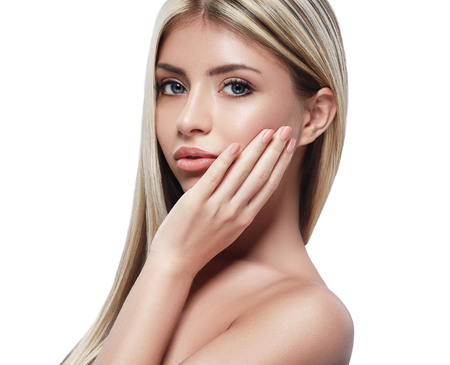Beautiful woman portrait with blond hair on whiteの写真素材